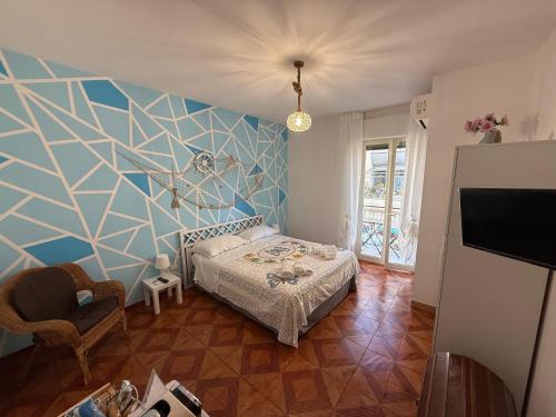 Ένα ή περισσότερα κρεβάτια σε δωμάτιο στο Casa Immacolata Affittacamere