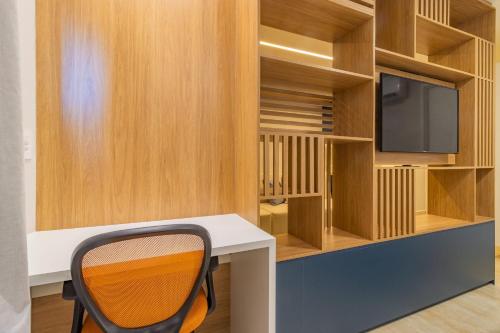 Tolive Riverside HOUSI by Carpediemにあるテレビまたはエンターテインメントセンター