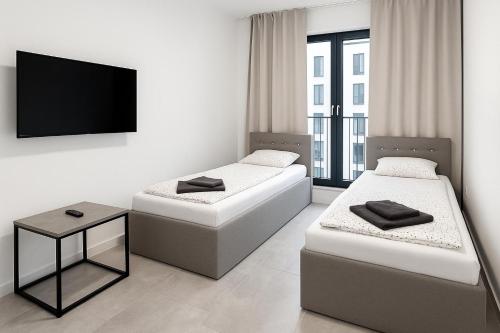 Apartmán s balkónom a parkovaním