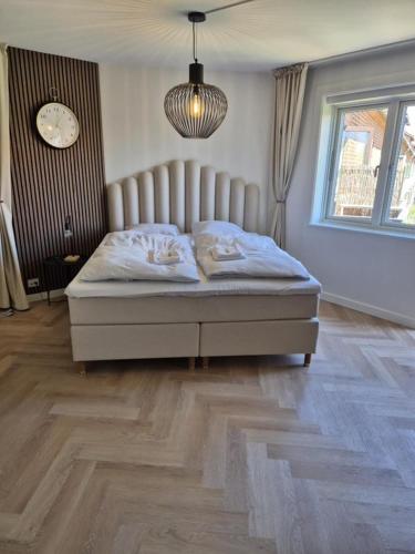 Postel nebo postele na pokoji v ubytování Stylish Studio in Copenhagen