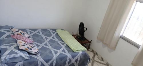 Ένα ή περισσότερα κρεβάτια σε δωμάτιο στο Aguiar beach house