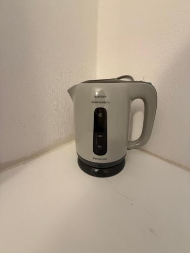 a coffee pot sitting on top of a counter at Naxos City Hostel in Naxos Chora
