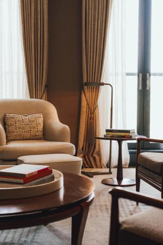 a living room with a couch and a table at Fasano Fifth Avenue I Private Members Club & Hotel in New York