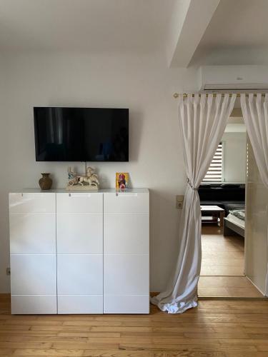 Μια τηλεόραση ή/και κέντρο ψυχαγωγίας στο Modernes Stadthaus im Zentrum