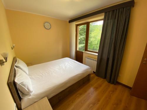 Un ou plusieurs lits dans un hébergement de l'établissement Tsaghkadzor Family Villa