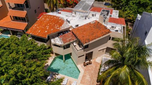 an overhead view of a house with orange roofs at Hotel Boutique Maraf Cancun in Cancún