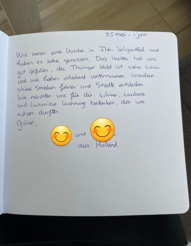 a piece of paper with two smiles on it at Ferienhaus Marina in Floh