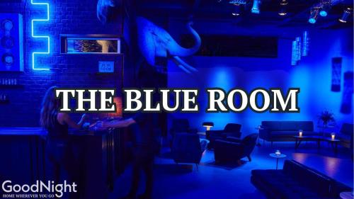 a blue room with a sign that reads the blue room at The Saddlery-Playlist-2 Units-Walk to Broadway in Nashville
