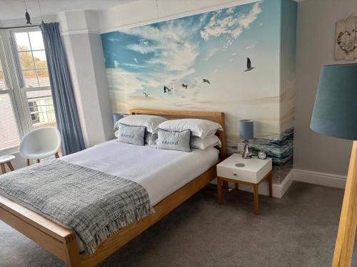 Ένα ή περισσότερα κρεβάτια σε δωμάτιο στο Channel Vista Guest House