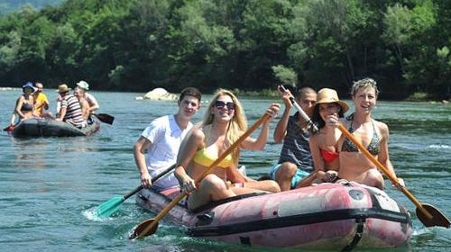 a group of people on a raft in the water at Hotel Royal Drina in Mali Zvornik