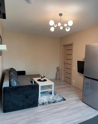 Телевизор и/или развлекательный центр в Apartamentai prie BIG