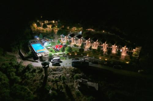 an aerial view of a mansion at night at Bujtina Adora in Ara të Lumit