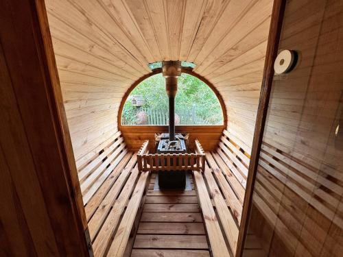 an inside view of a sauna with a window at Готель Довбуш in Yaremche