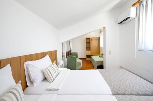 Ένα ή περισσότερα κρεβάτια σε δωμάτιο στο Morpheas Apartments