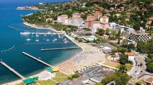 an aerial view of a beach with boats in the water at SEA and SUN Ankaran, near the Beach, free Parking and Wi-Fi, stunning sunset, 80m2 in Ankaran
