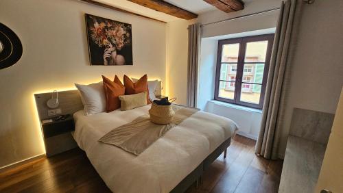 Postel nebo postele na pokoji v ubytování Gîte Du XVe