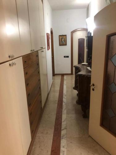 a hallway of a bathroom with a vanity and a sink at Pompei Ruins in Torre Annunziata