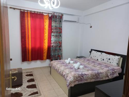 Ένα ή περισσότερα κρεβάτια σε δωμάτιο στο Ulliri 2