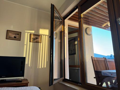 TV a/nebo společenská místnost v ubytování Olympic Park A403 Kołobrzeg