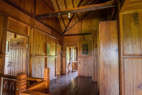 Katil atau katil-katil dalam bilik di Sawah Indah View Guesthouse