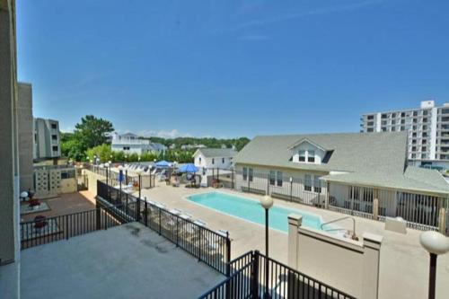 a view of a swimming pool in a building at Virginia one #517 in Rehoboth Beach