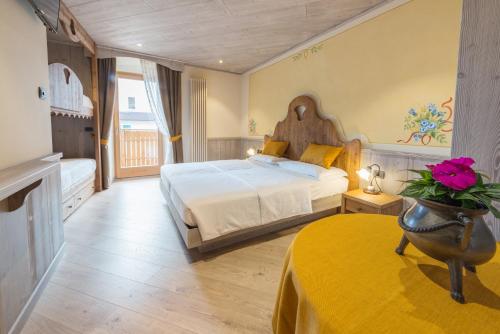 En eller flere senge i et værelse på Agritur Casa Fabri