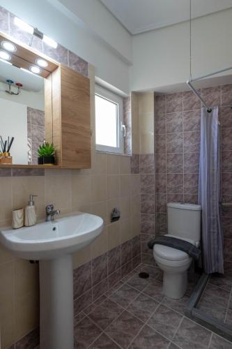Un baño de Kalamata Downtown Cuties