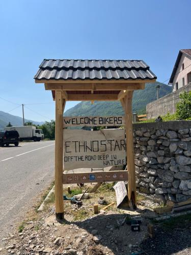 a sign on the side of a road at ETHNO STAR Bojović in Gusinje