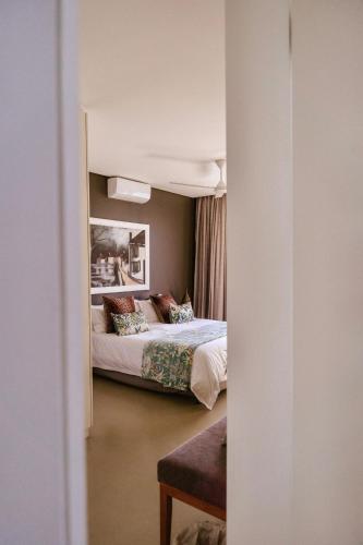 Ένα ή περισσότερα κρεβάτια σε δωμάτιο στο Maison De Plage