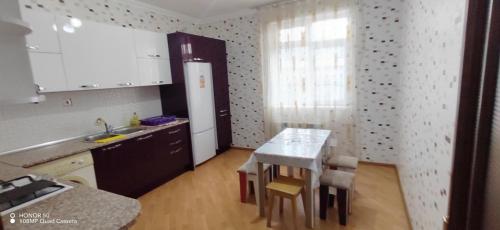 Virtuvė arba virtuvėlė apgyvendinimo įstaigoje Lovely house