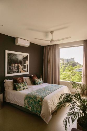 Ένα ή περισσότερα κρεβάτια σε δωμάτιο στο Maison De Plage
