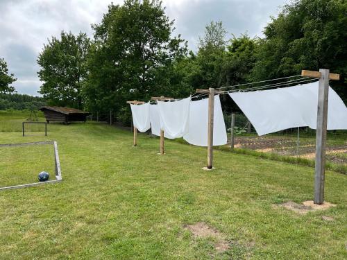 a fence with a net and a soccer ball at Jensens B&B in Egtved