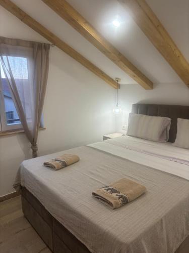 Ένα ή περισσότερα κρεβάτια σε δωμάτιο στο Srima Angel´s Apartments