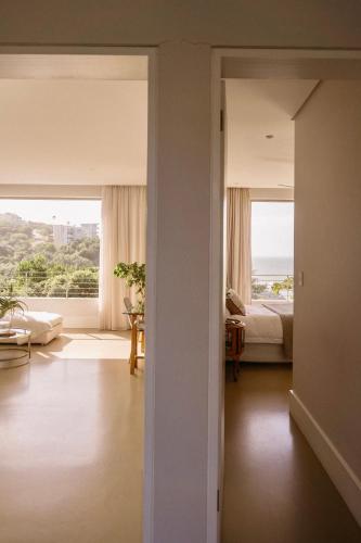 Ένα ή περισσότερα κρεβάτια σε δωμάτιο στο Maison De Plage