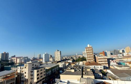 a view of a city with tall buildings at Hotel Ponta Grossa São Marcos in Ponta Grossa