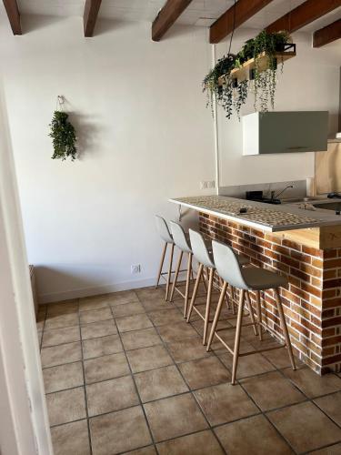 Kuchyň nebo kuchyňský kout v ubytování Appartement avec balcon