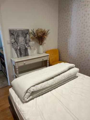 Postel nebo postele na pokoji v ubytování Appartement avec balcon