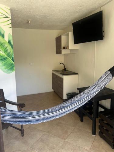TV a/nebo společenská místnost v ubytování playa alta taganga