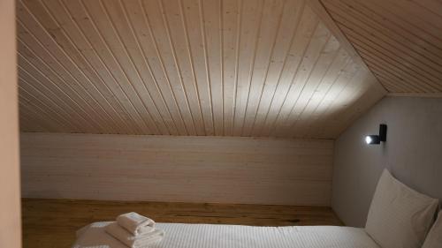 Una cama o camas en una habitación de Hotel Kazak Club