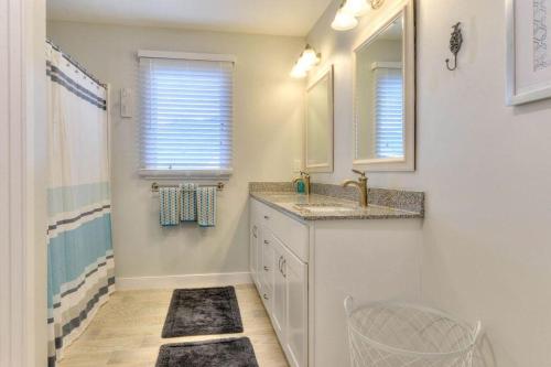 a bathroom with a sink and a mirror at Bayard avenue 2202b in Dewey Beach