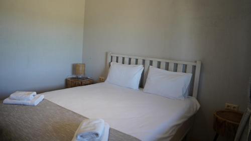Una cama o camas en una habitación de Hotel Kazak Club