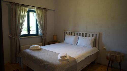 Una cama o camas en una habitación de Hotel Kazak Club