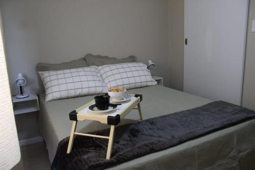 Katil atau katil-katil dalam bilik di Apt perto Shopping Iguatemi com garagem