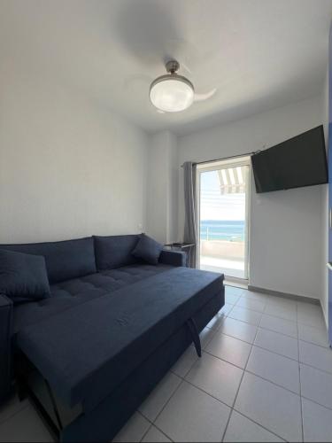 TV a/nebo společenská místnost v ubytování VK Beach House