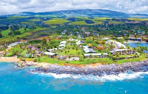 an aerial view of a resort on the beach at Napili Shores - Ocean Front Ground Floor in Kahana