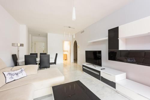 Stylish 2-Bed Apartment with Large Terrace & Pool