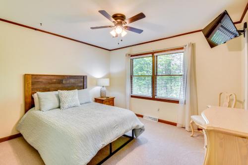 a bedroom with a bed and a ceiling fan at Deck and Game Room Mountaintop Hideaway in Tiger! in Tiger