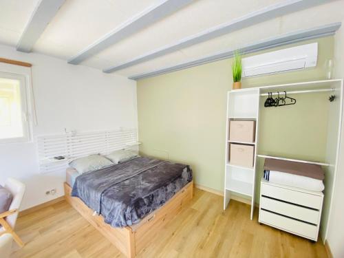 Postel nebo postele na pokoji v ubytování Studio Cosy, Rénové, Ecrin de calme & confort