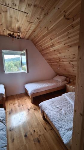Postel nebo postele na pokoji v ubytování Pine