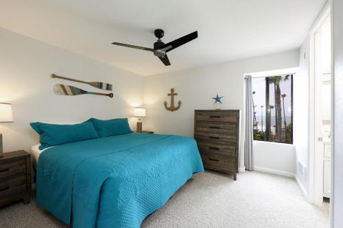Postel nebo postele na pokoji v ubytování Oceanside Beach Condos